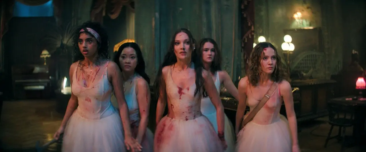 Pretty Lethal (March 25, Prime Video)
The story follows a troupe of five elite ballerinas whose bus breaks down in a remote forest while traveling to a prestigious competition in Budapest. They seek shelter at a mysterious roadside inn run by Devora Kasimer (Uma Thurman), a reclusive former ballet prodigy. The group soon discovers they have walked into a deadly trap and must weaponize their years of brutal dance training—including using pointe shoes as tools for survival—to fight their way out